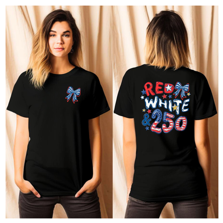Black t-shirt with red, white, and blue designs on a beige curtain background
